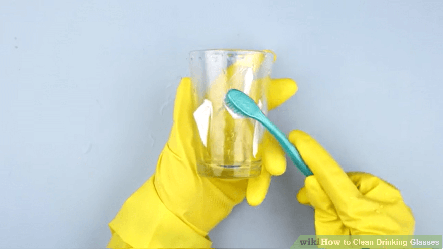 toothpaste on wine glass